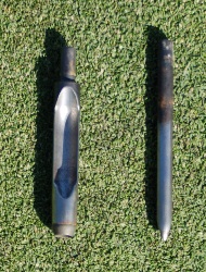 A close up image of metal tines for an aerator machine.